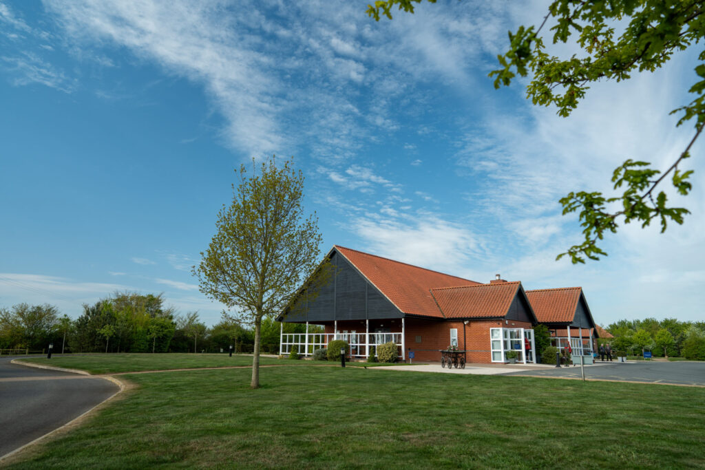 Exterior of Waveney Memorial Park crematorium building with red tiled roof